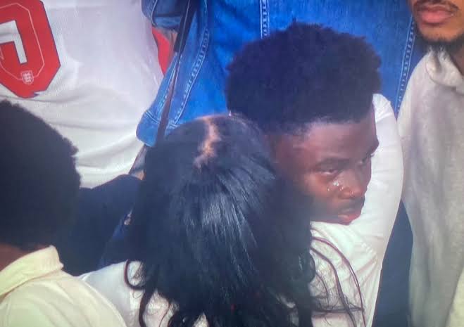 Bukayo Saka hugs her mother Nike Saka with tears after Euro 2020 final.  