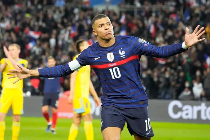 Kylian Mbappe celebrates one of his goals against Kazakhstan on Saturday. 
