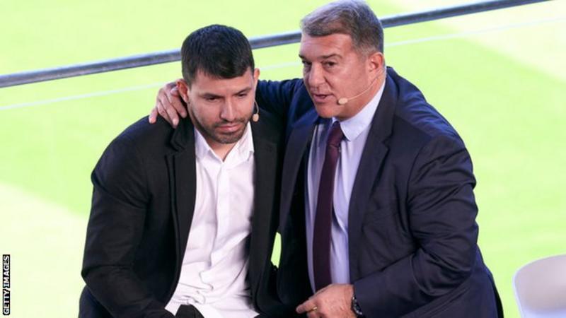 Sergio Aguero who was overwhelmed with emotions after he announced his retirement from football was consoled by FC Barcelona president Joan Laporta.