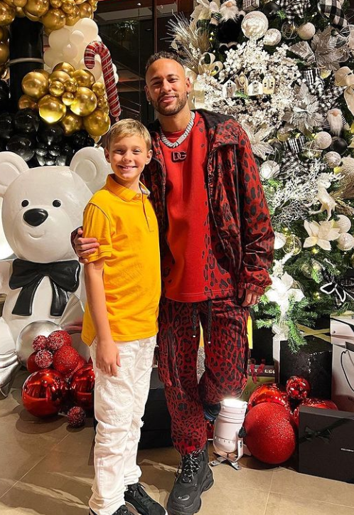 Neymar posing with his son, Davi Lucca da Silva Santos.