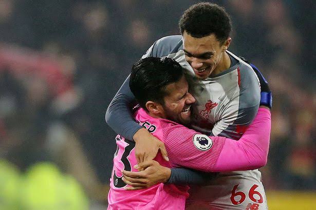 Trent Alexander-Arnold and Alisson Becker.