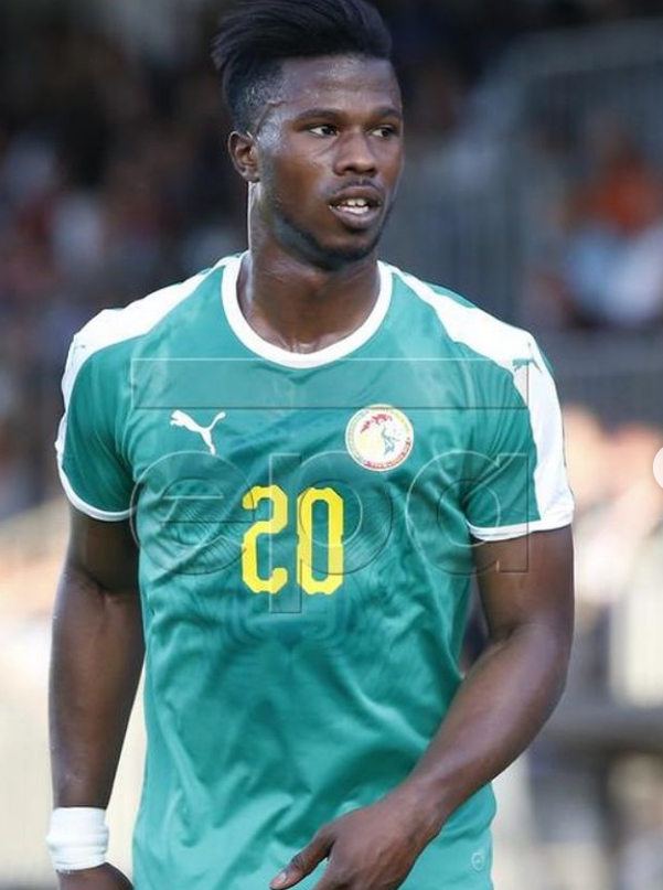 Keita Balde in Senegalese kit when his skin is darker. 