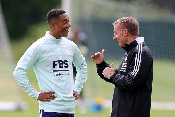 Youri Tielemans having a chat with Brendan Rodgers.