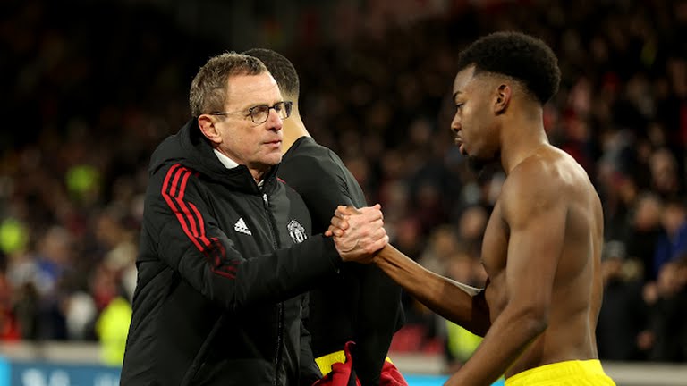 Ralf Rangnick shakes hands with Anthony Elanga, one of Manchester United's goalscorers against Brentford. 