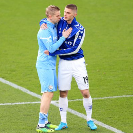 Oleksandr Zinchenko of Manchester City exchanged a heart-touching embrace with his countryman, Vitaliy Mykolenko of Everton during a pre-match warm-up at Goodison Park on Saturday.