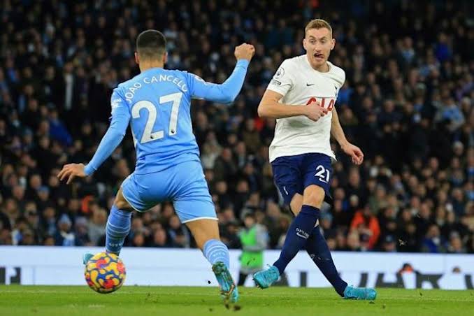 Harry Kane throws the title race wide open as Tottenham   leave the Etihad with a 3-2 victory over Manchester City