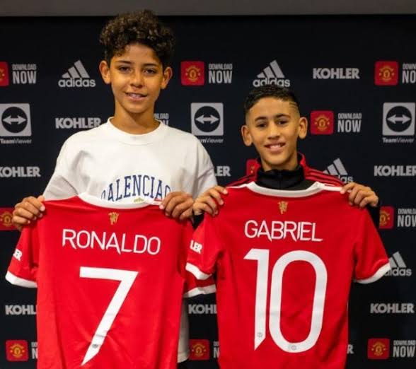 Cristiano Ronaldo Jr and his academy teammate Gabriel during their unveiling as Manchester United academy players. 