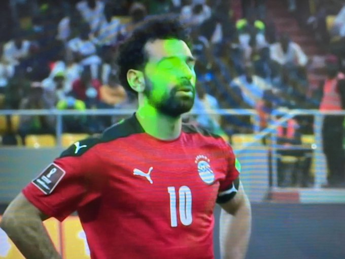 Mohamed Salah of Egypt was forced to play his penalty to the sky due to 'barrage of lasers' from Senegal fans