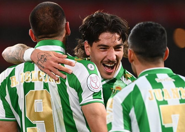 Hector Bellerin celebrates with his teammates after Real Betis won the Spanish title. 