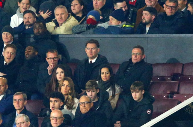 Ralf Rangnick watching Manchester United vs Arsenal at Old Trafford with his girlfriend, Flor, sitting in front of him.