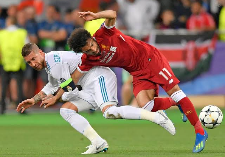 A scene of Sergio Ramos' tackle on Mohamed Salah that left the Egyptian winger injured in the 2018 UEFA Champions League final.