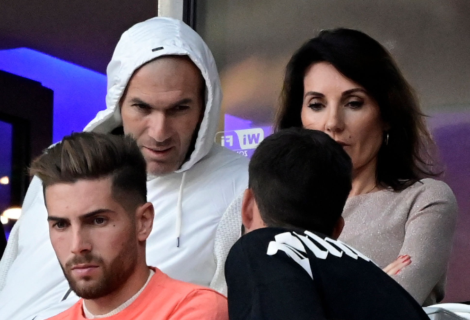 Zinedine Zidane (in a white hoodie) and his wife Véronique Zidane during the UEFA Champions League final in Paris. 