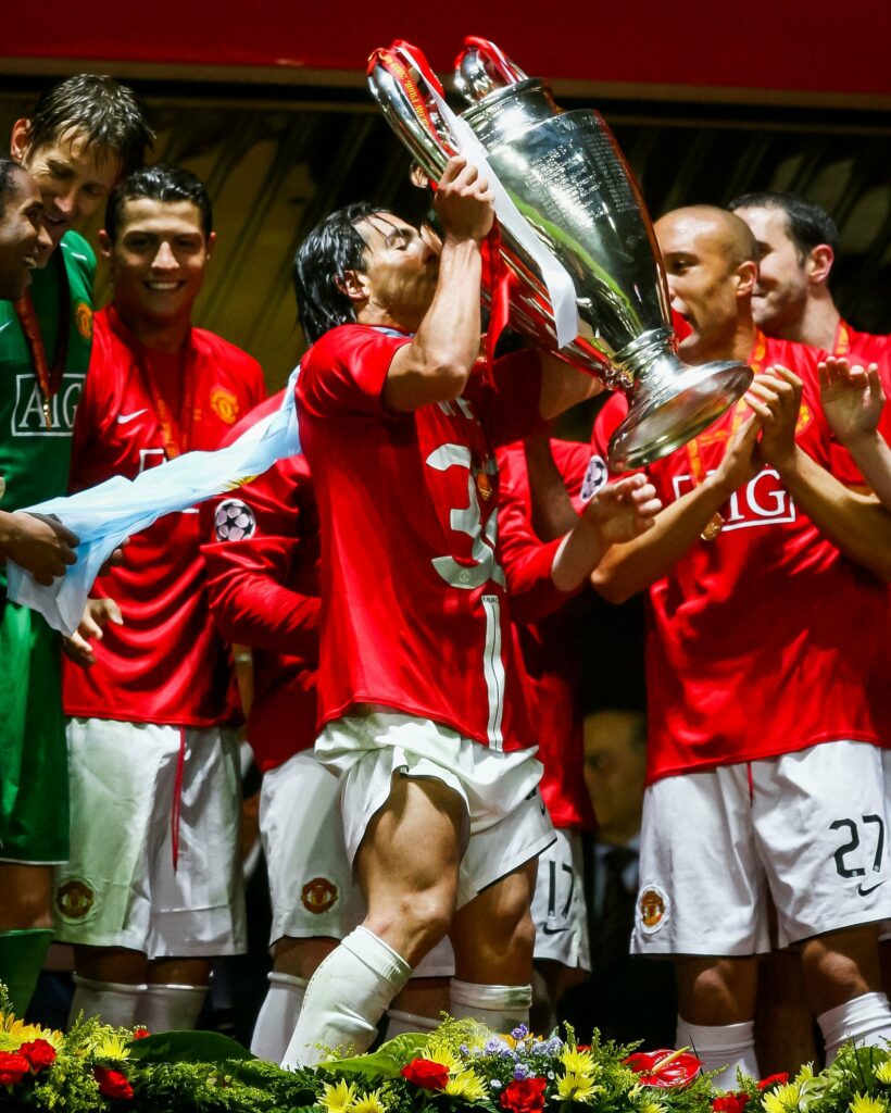 Carlos Tevez lift the UEFA Champions League title with Manchester United during the 2007-2008 season. 