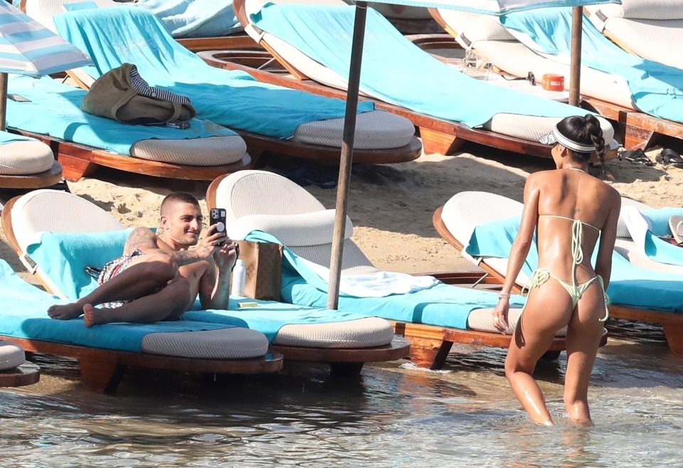 Marco Verratti unwinds on a Miami beach with his model wife Jessica after World Cup heartbreak