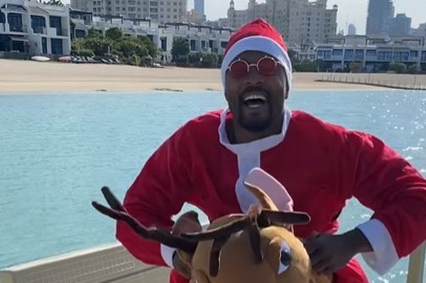 Patrice Evra Had Fans Talking As He Dresses Up As Santa Rides Rudolph And Went For A Swim