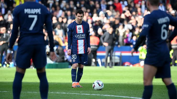 Lionel Messi getting ready to curl one of his trademark free-kicks against Lille 