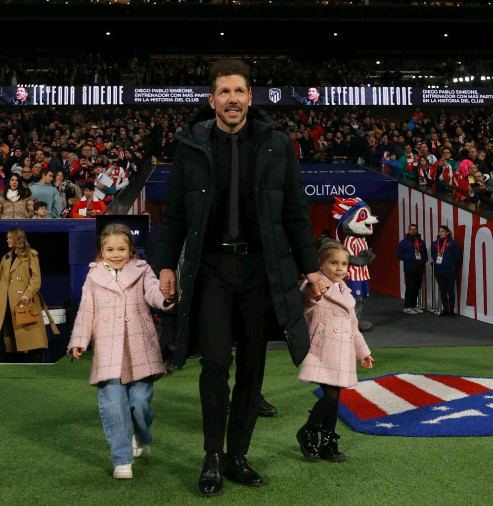 Diego Simone and his daughters
