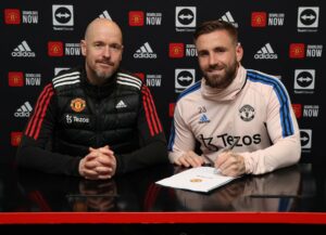 Luke Shaw signing a contract extension with Manchester United