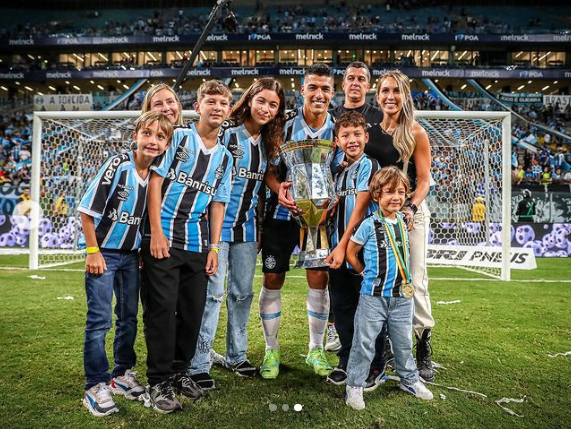 Luis Suarez Celebrates First Gremio Trophy With Family