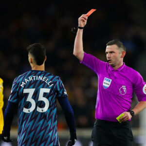 Michael Oliver showing a red card to Arsenal's Gabriel Martinelli