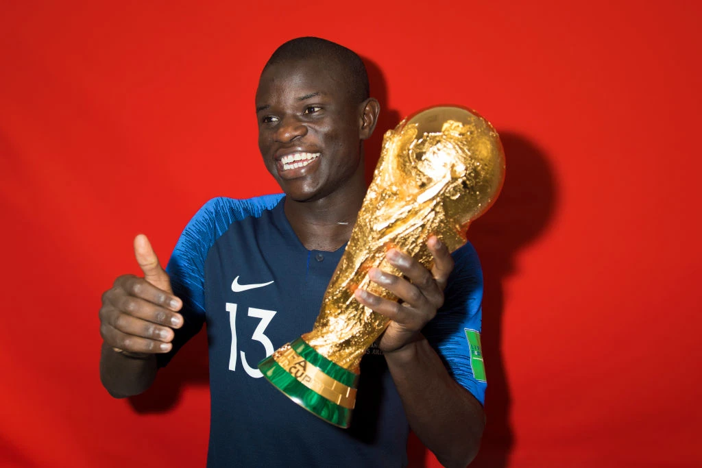 N'Golo Kante with the FIFA World Cup.