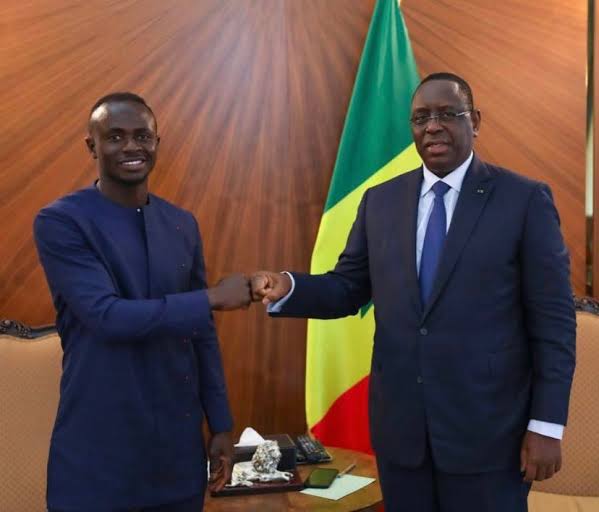 Sadio Mane (left) and Senegal President, Macky Sall (right)